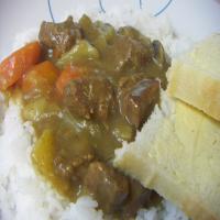 Curry Beef Stew Served over Steamed Rice_image