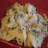 Sausage Ravioli With Sauteed Portabellas, Tomatoes, Spinach_image