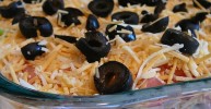 taco-dip-with-refried-beans-recipe-allrecipes image