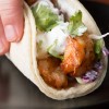 grilled-shrimp-tacos-with-creamy-cilantro-sauce-tasty image
