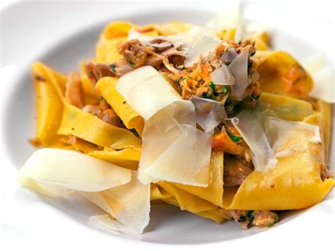 braised-rabbit-with-fresh-pappardelle-food-network image