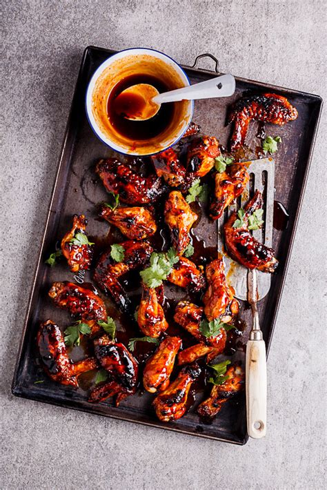 sticky-sriracha-honey-chicken-wings-simply-delicious image
