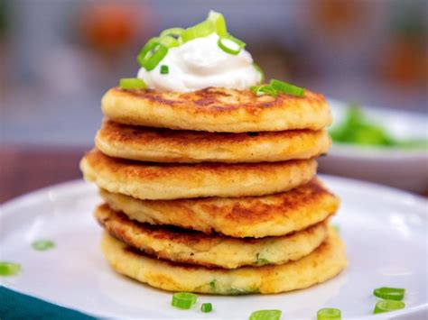 cheesy-leftover-mashed-potato-pancakes-recipe-food image