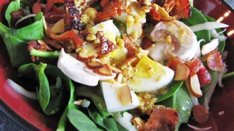 spinach-salad-with-warm-bacon-mustard-dressing image