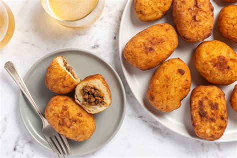 papas-rellenas-stuffed-potato-balls-recipe-the-spruce image