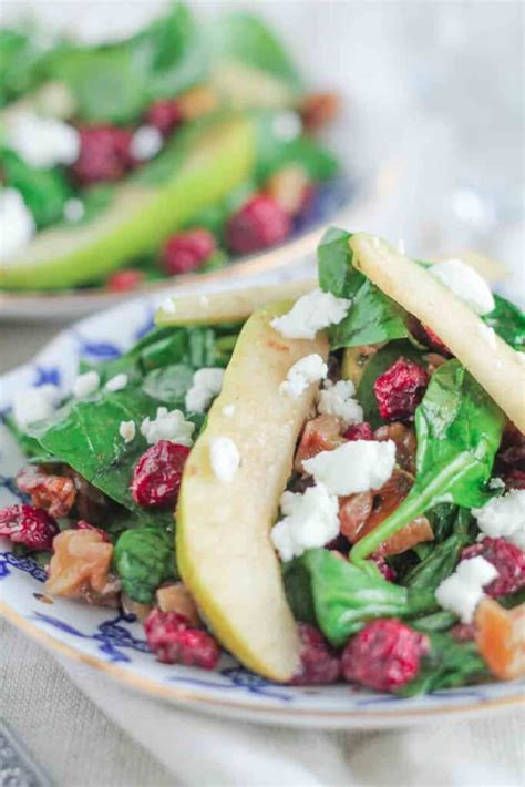 spinach-salad-with-cranberries-walnuts-pears-and image