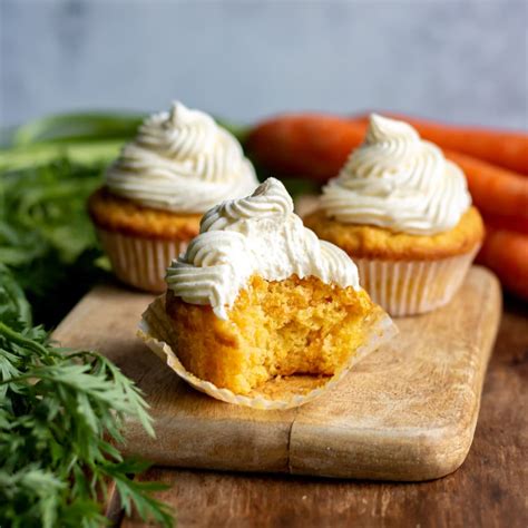 carrot-cupcakes-with-orange-icing-veggie-desserts image