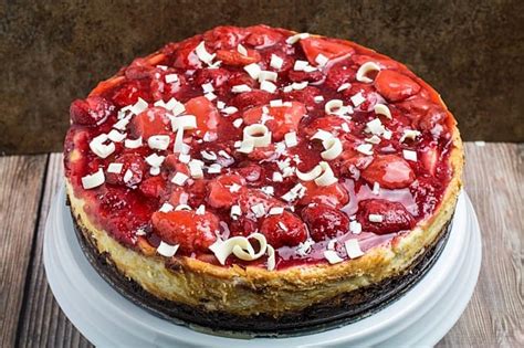 easy-white-chocolate-strawberry-cheesecake-dishing image