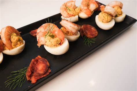 recipe-harissa-spiced-deviled-eggs-from-the-vine image