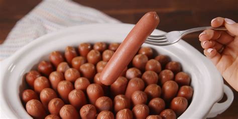 slow-cooker-hot-dogs-delish image