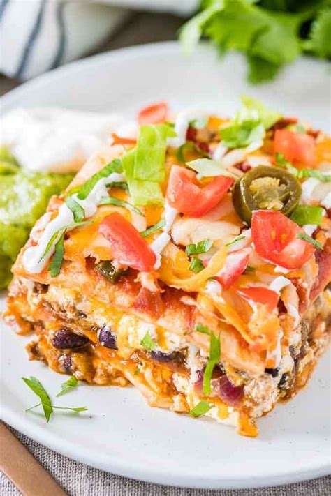 taco-lasagna-with-tortillas-and-beef-plated-cravings image