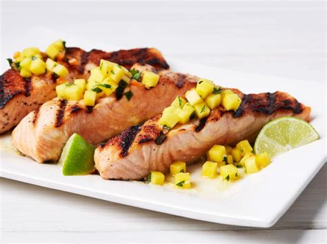 grilled-salmon-with-spicy-mango-salsa-food-network image