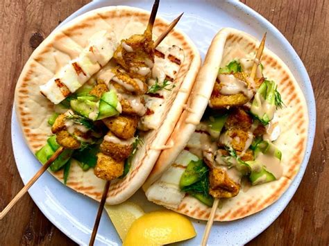 grilled-chicken-kebabs-with-pita-halloumi-and-shaved-food image