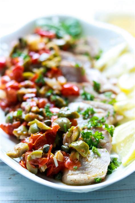 grilled-ahi-tuna-with-sauteed-tomatoes-capers-and-olives image