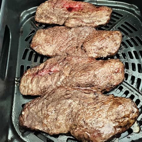 air-fryer-steak-with-garlic-herb-butter-famfoodery image
