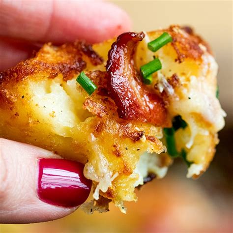 smashed-roast-potatoes-with-garlic-bacon-and-cheddar image