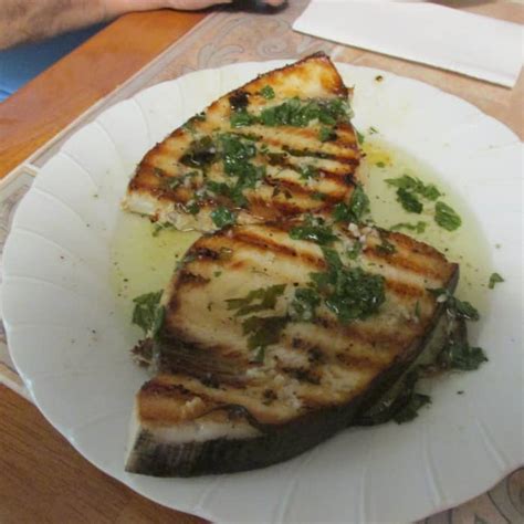 grilled-swordfish-with-lemon-mint-and-basil-delishably image