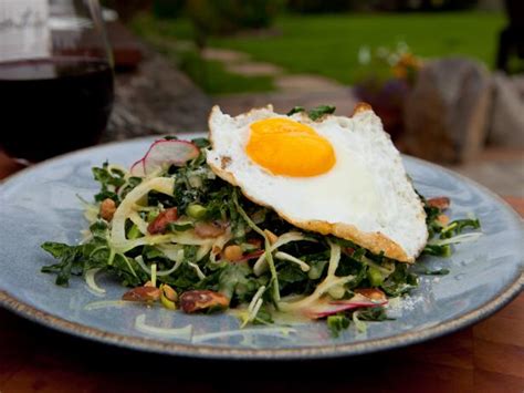 italian-kale-slaw-with-sunny-side-up-eggs-food image