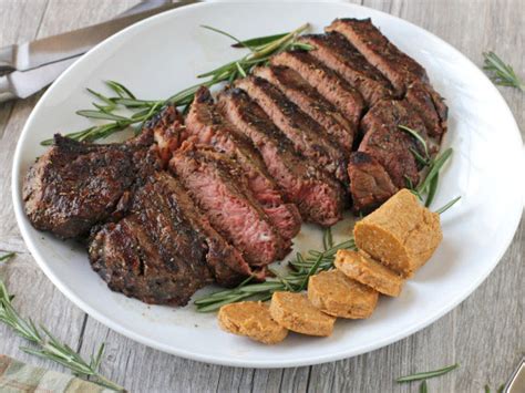 grilled-porterhouse-steak-with-paprika-parmesan-butter image