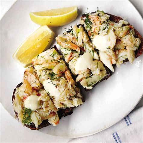 crab-toast-with-lemon-aioli-recipe-fathom-seafood image