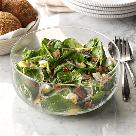 spinach-salad-with-warm-bacon-dressing-taste-of-home image