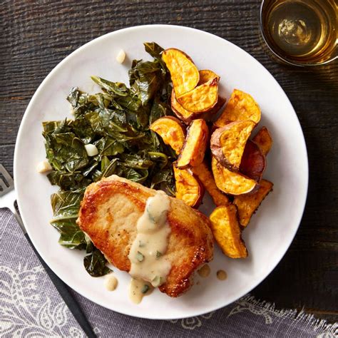 maple-gravy-smothered-pork-chops-with-stewed-collard image