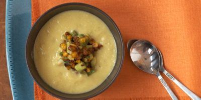 fresh-corn-soup-topped-with-roasted-corn-guacamole image