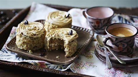 mini-coffee-and-walnut-cakes-recipe-bbc-food image