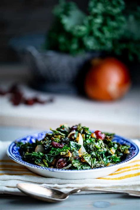 sauteed-balsamic-kale-with-dried-cranberries-healthy image