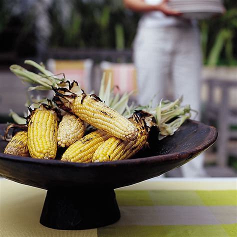 smoky-grilled-corn-with-parmesan-butter-food-wine image