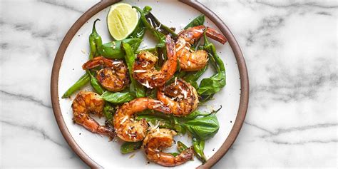 grilled-coconut-shrimp-with-shishito-peppers-epicurious image