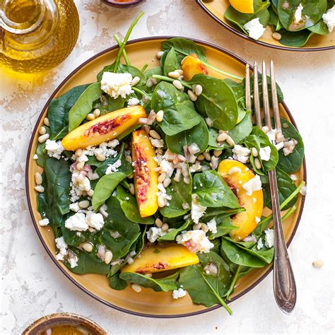 peach-spinach-salad-with-feta-recipe-eatingwell image