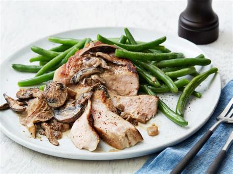 pork-chops-with-creamy-mushrooms-recipe-food-network image