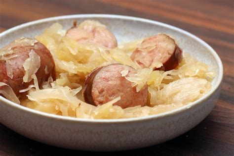 easy-sausage-bake-with-sauerkraut-and-apples-the image