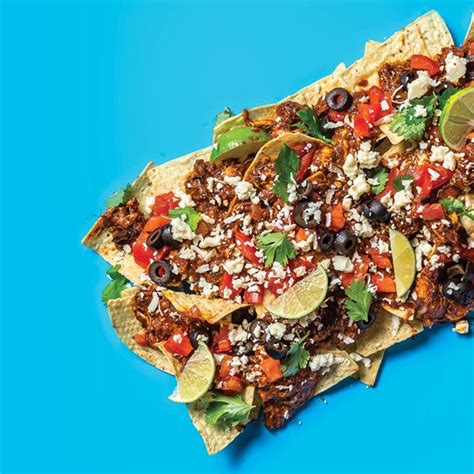 best-nachos-of-all-time-recipe-andrew-zimmern-food-wine image