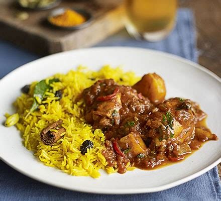 cape-malay-chicken-curry-with-yellow-rice-bbc-good-food image