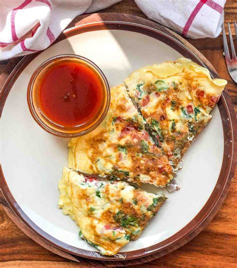 cheese-masala-omelette-recipe-archanas-kitchen image
