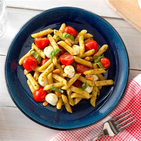 quick-penne-pesto-with-tomatoes-allrecipes image