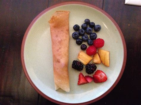 breakfast-crepes-with-berries-and-cream-alison-chino image