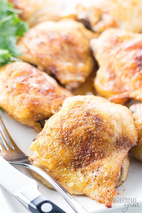 crispy-oven-baked-chicken-thighs-wholesome-yum image