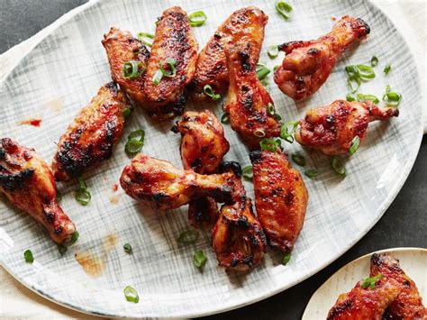 cranberry-glazed-sticky-chicken-wings-food-network image