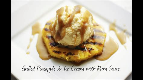 grilled-pineapple-with-vanilla-ice-cream-rum-sauce image
