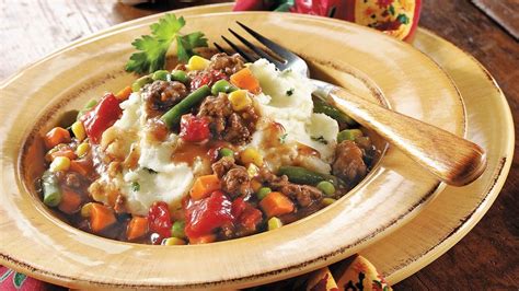 beef-stew-over-mashed-potatoes image