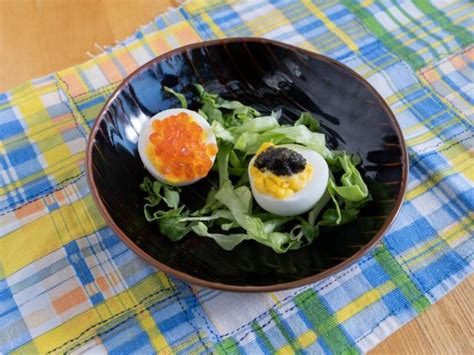 deviled-eggs-with-caviar-and-salmon-roe-food-network image