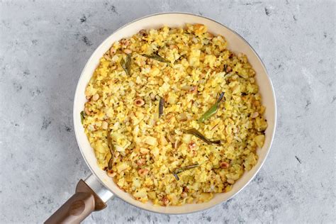 indian-flattened-rice-dish-poha-recipe-the-spruce-eats image