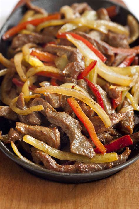 veal-with-peppers-and-mushrooms-recipe-the-spruce image
