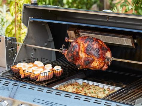 grilled-rotisserie-turkey-with-stuffing-food-network image