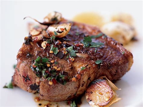 lamb-chops-with-sizzled-garlic-with-a-lemony-pan-sauce image