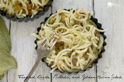 tangled-apple-pistachio-and-golden-raisin-salad image