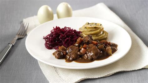 lamb-red-wine-and-rosemary-casserole-recipe-bbc-food image